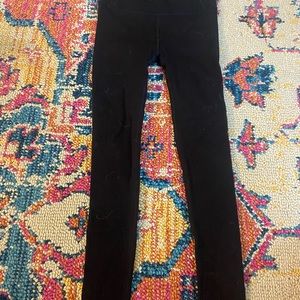 Black Lululemon Leggings with mesh cutouts